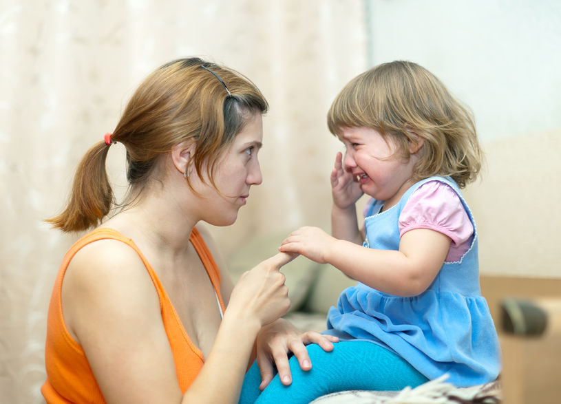 woman berates crying baby in home